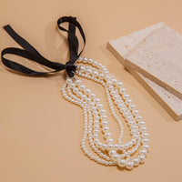 Thumbnail for Baroque Layered Ribbon Bowknot Pearl Chain Necklace - ArtGalleryZen