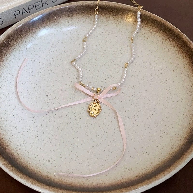 Baroque Pink Ribbon Bowknot Relief Pendant Pearl Necklace - ArtGalleryZen