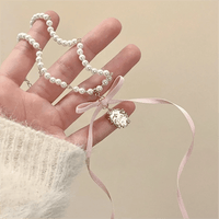 Thumbnail for Baroque Pink Ribbon Bowknot Relief Pendant Pearl Necklace - ArtGalleryZen