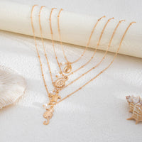 Thumbnail for Bohemia 4pcs Conch Turtle Seahorse Pearl Tassel Saturn Chain Necklace Set - ArtGalleryZen