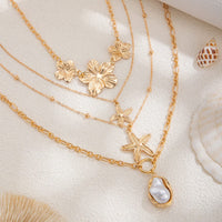Thumbnail for Bohemia 4pcs Irregular Pearl Flower Starfish Pendant Necklace Set - ArtGalleryZen