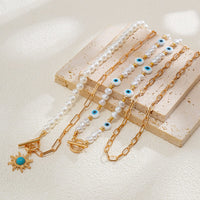 Thumbnail for Boho Layered Toggle Clasp Turquoise Sun Pendant Evil Eye Pearl Chain Necklace Set - ArtGalleryZen