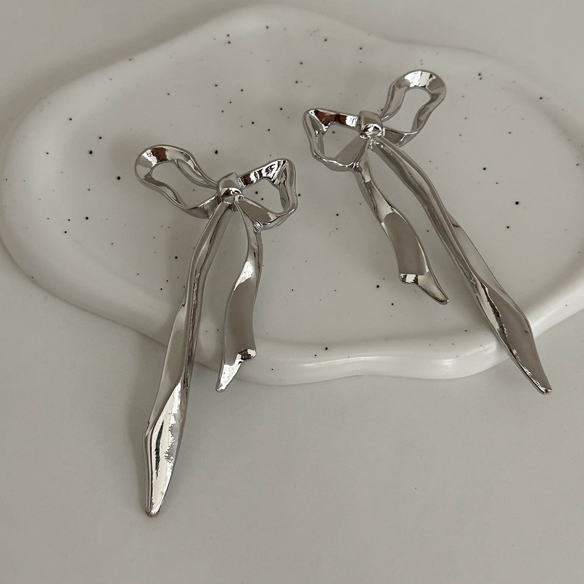 Chic Curved Ribbon Bowknot Stud Earrings - ArtGalleryZen