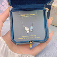 Thumbnail for Chic CZ Inlaid Natural Pearl Shell Flapping Wings Butterfly Necklace - ArtGalleryZen