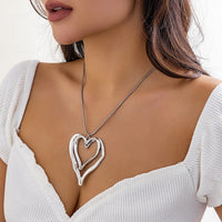 Thumbnail for Chic Double Hollow Heart Pendant Necklace - ArtGalleryZen