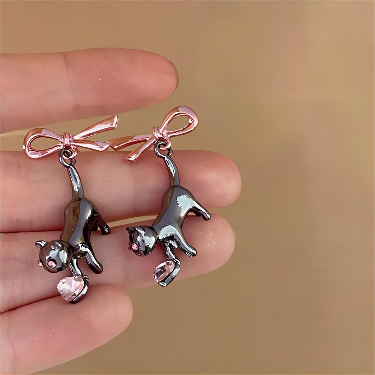 Chic Pink Crystal Heart Dangling Ribbon Cat Earrings - ArtGalleryZen