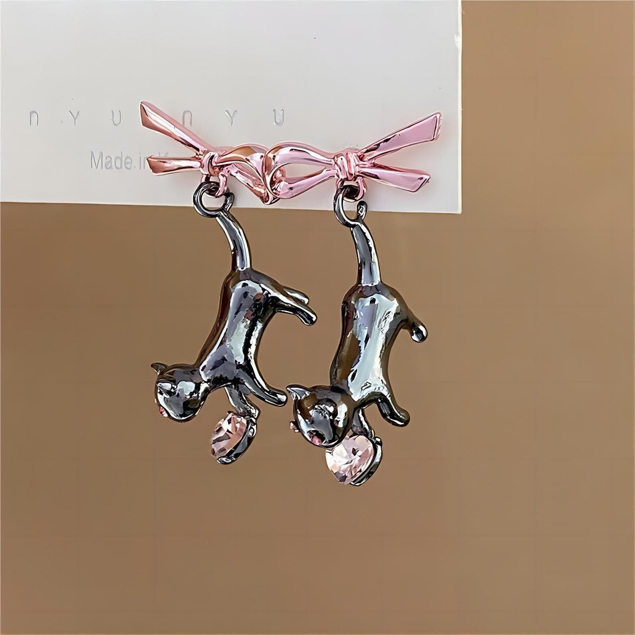 Chic Pink Crystal Heart Dangling Ribbon Cat Earrings - ArtGalleryZen