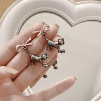 Thumbnail for Chic Pink Crystal Heart Dangling Ribbon Cat Earrings - ArtGalleryZen