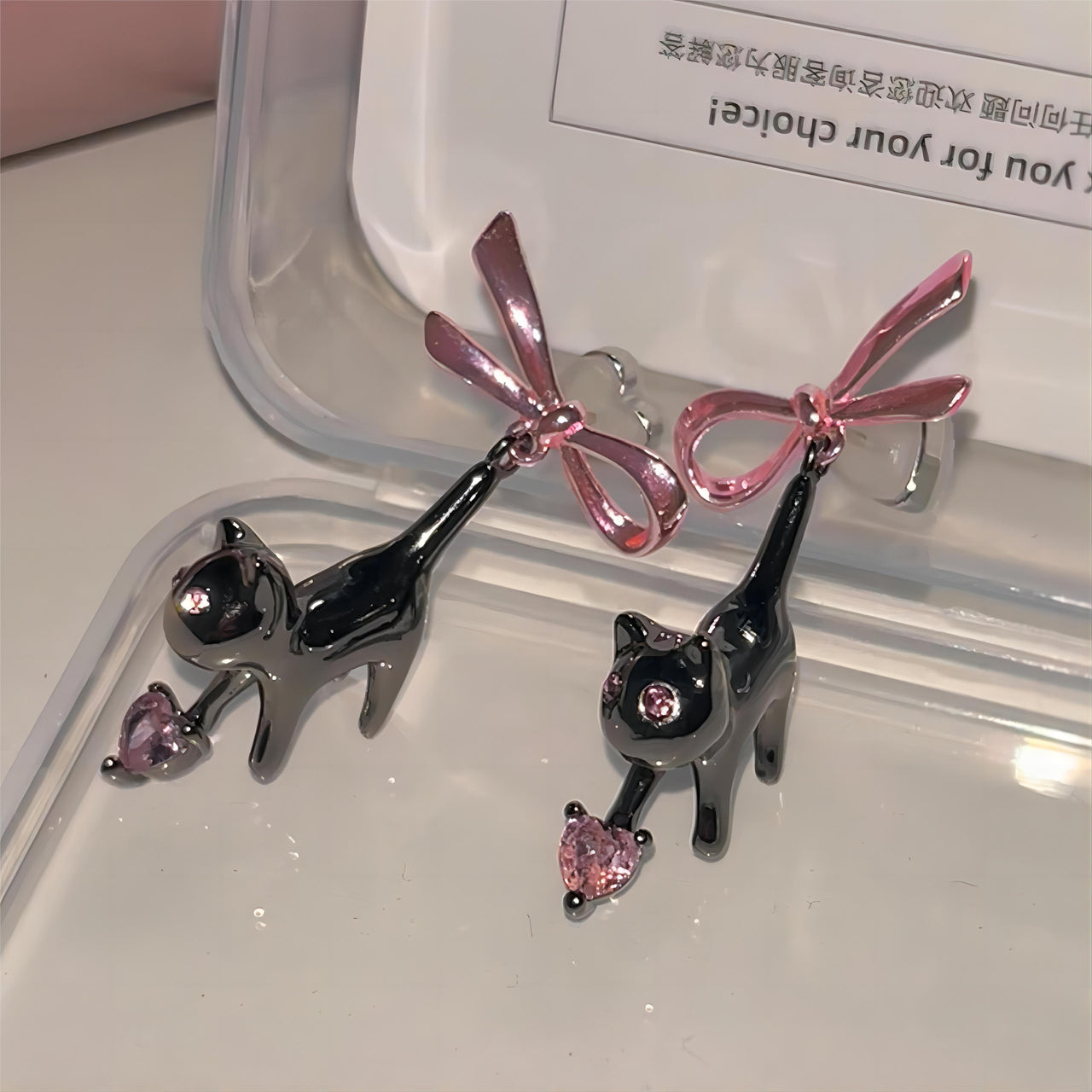 Chic Pink Crystal Heart Dangling Ribbon Cat Earrings - ArtGalleryZen