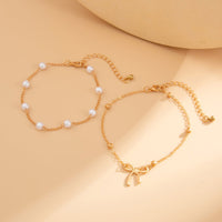 Thumbnail for Elegant 2pcs Bowknot Charm Pearl Chain Anklet Set - ArtGalleryZen