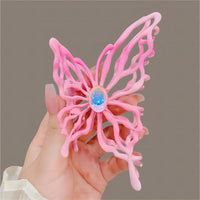 Thumbnail for Geometric Pink Hollow Butterfly Chignon Claw Clip Hair Clip - ArtGalleryZen