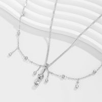 Thumbnail for Shining Layered CZ Inlaid Tassel Navel Piercing Belly Chain - ArtGalleryZen