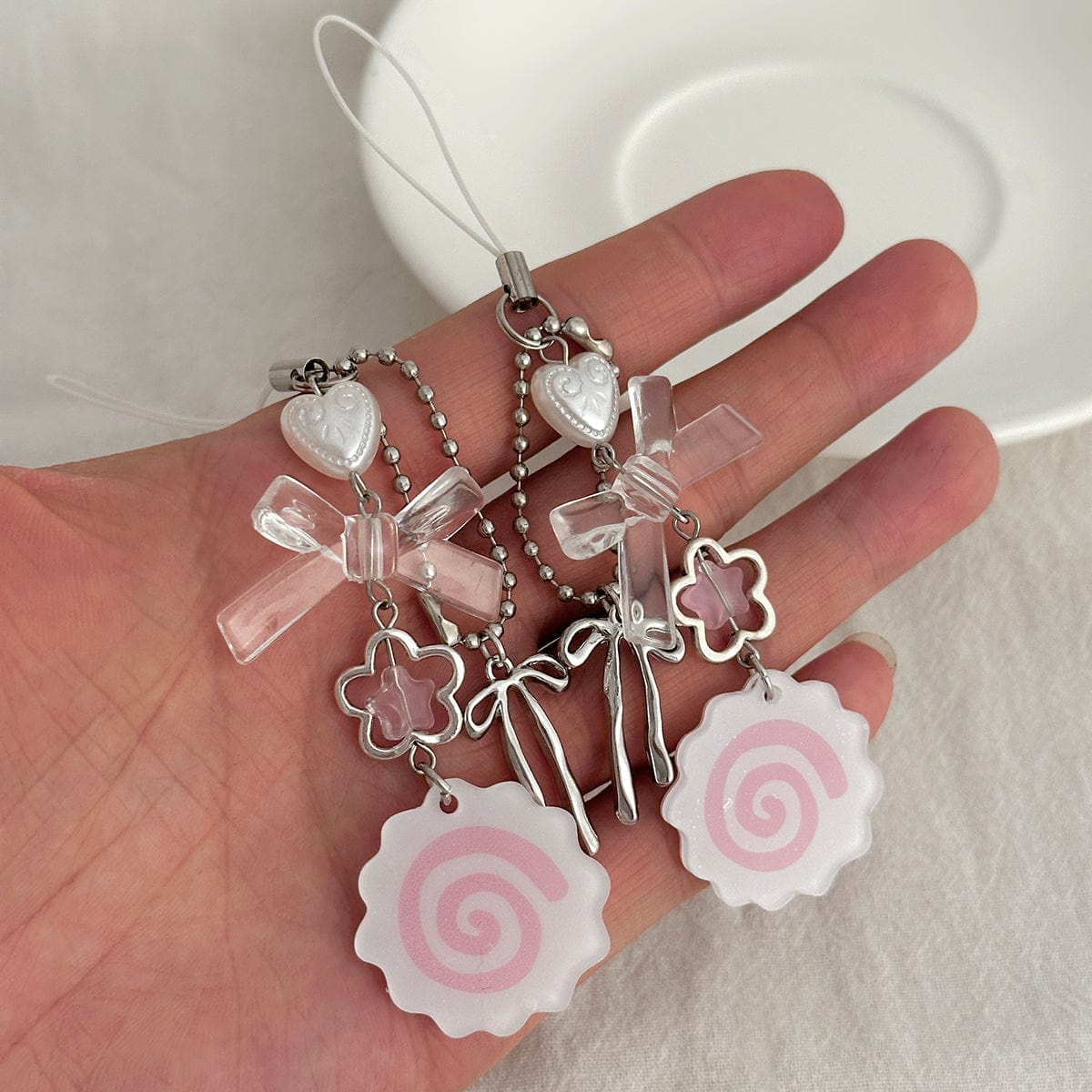 Sweet 2pcs Narutomaki Bowknot Heart Keychain Phone Strap Set - ArtGalleryZen