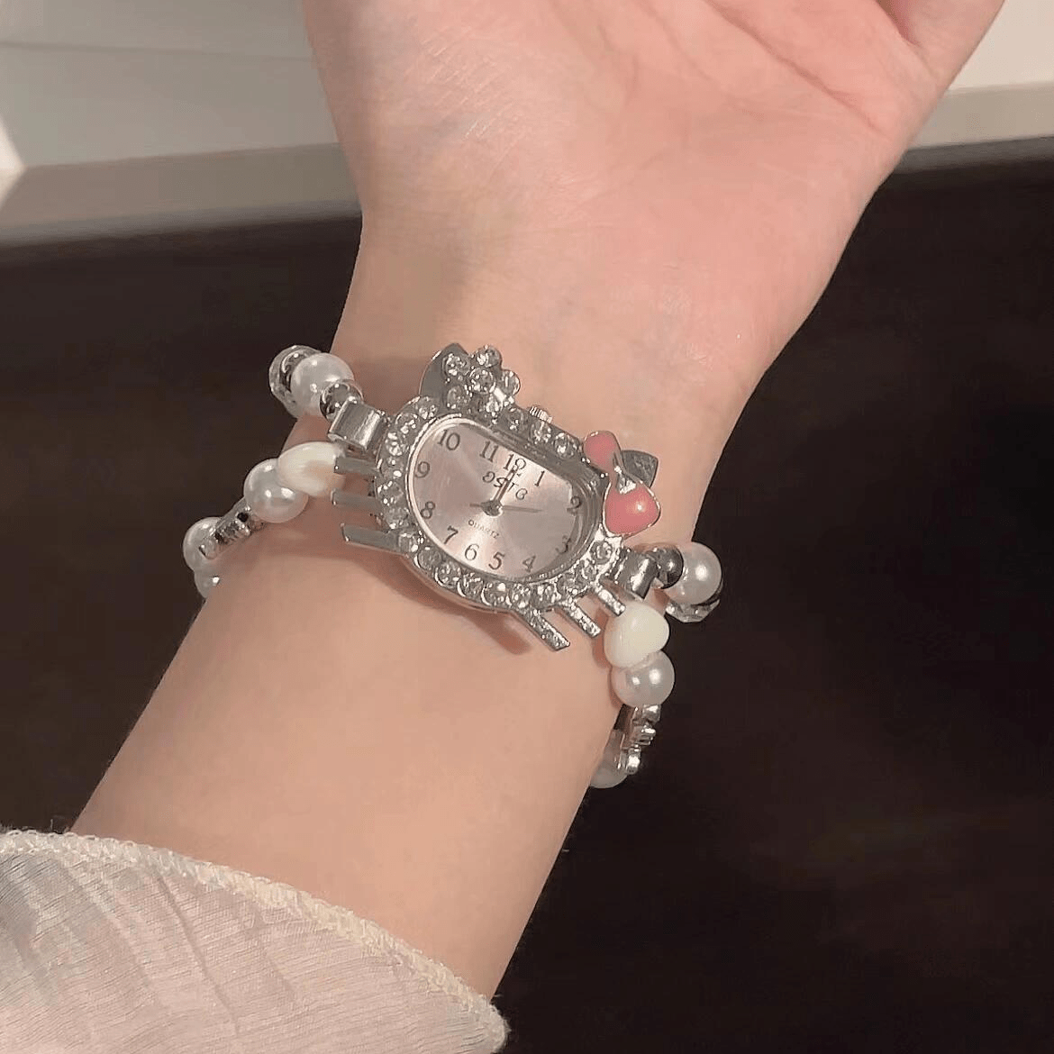Sweet Rhinestone Inlaid Cupid Charm Pearl Chain Hello Kitty Watch - ArtGalleryZen