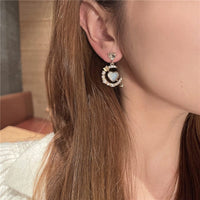 Thumbnail for Chic CZ Inlaid Cupid Arrow Heart Dangle Earrings - ArtGalleryZen