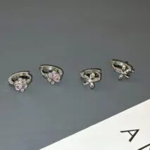 Dainty CZ Inlaid Cat Claw Bowknot Huggie Hoop Earrings - ArtGalleryZen