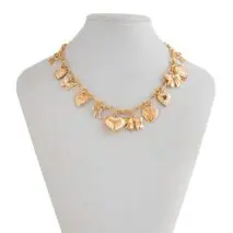 Elegant Gold Silver Tone Relief Heart Bowknot Tassel Necklace - ArtGalleryZen