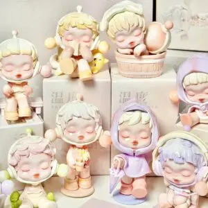 Collection of pastel-colored Pop Mart Skullpanda figurines on a white background