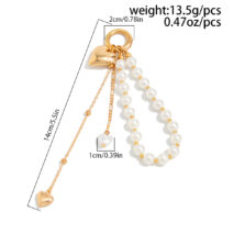 Elegant Gold Tone Heart Pendant Pearl Keychain - Image 7