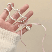 Baroque Pink Ribbon Bowknot Relief Pendant Pearl Necklace - ArtGalleryZen