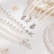 Chic 5pcs Bowknot Shell Starfish Pendant Pearl Chain Necklace Set - ArtGalleryZen