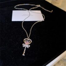 Chic CZ Inlaid Bowknot Heart Magic Wand Necklace - ArtGalleryZen