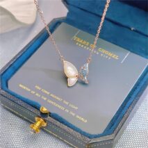 Chic CZ Inlaid Natural Pearl Shell Flapping Wings Butterfly Necklace - ArtGalleryZen