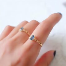 Chic Hollowed-out Sea Blue Topaz Ring - ArtGalleryZen