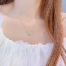 Dainty CZ Inlaid Rolling Crystal Angel Wings Necklace - ArtGalleryZen