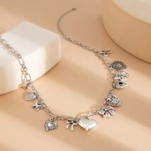 Elegant Gold Silver Tone Relief Heart Bowknot Tassel Necklace - ArtGalleryZen