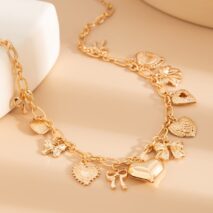 Elegant Gold Silver Tone Relief Heart Bowknot Tassel Necklace - ArtGalleryZen