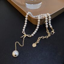 Elegant Rhinestone Inliad Bowknot Charm Pearl Chain Y Necklace - ArtGalleryZen