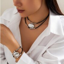 Ethnic style Layered Carved Oval Charm PU String Necklace Bracelet Set - ArtGalleryZen