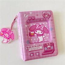 A collection of Sanrio themed 3 inch mini photocard albums featuring various characters such as Hello Kitty and My Melody. The albums come in different colors and designs, some with character portraits and others with character-themed backgrounds.