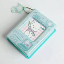 A collection of Sanrio themed 3 inch mini photocard albums featuring various characters such as Hello Kitty and My Melody. The albums come in different colors and designs, some with character portraits and others with character-themed backgrounds.