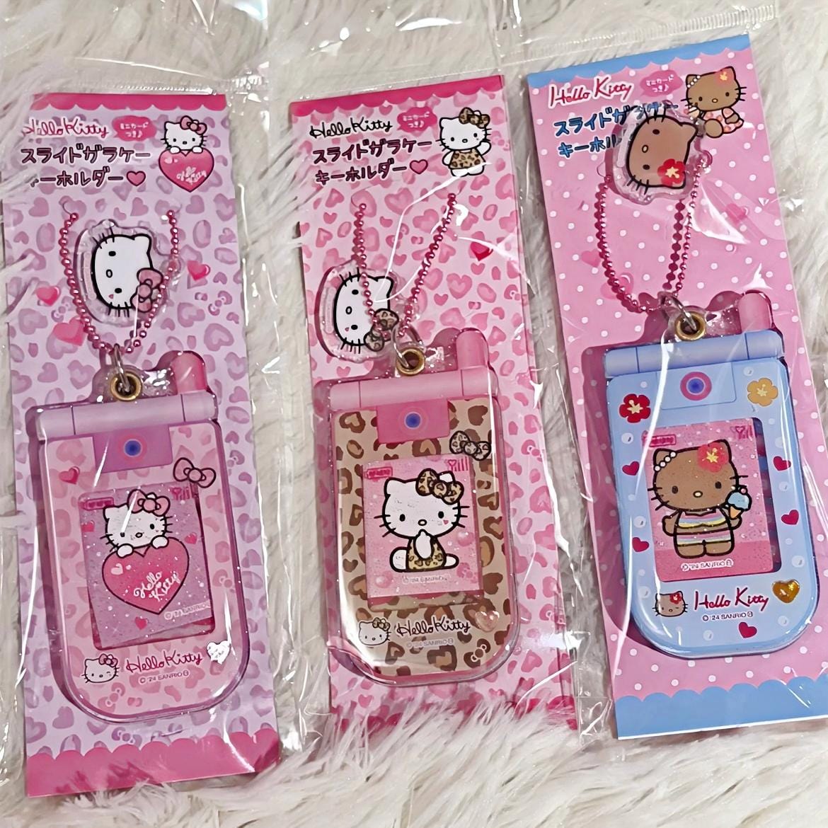 Sanrio Hello Kitty Slide Flip Phone Acrylic Keychain - ArtGalleryZen