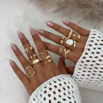 Stylish 12pcs Irregular Pearl Waterdrop Hollow Curved Ring Set - ArtGalleryZen