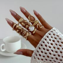 Stylish 12pcs Irregular Pearl Waterdrop Hollow Curved Ring Set - ArtGalleryZen