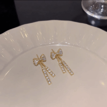 Trendy CZ Inlaid Bowknot Tassel Earrings - ArtGalleryZen