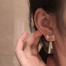 Trendy CZ Inlaid Bowknot Tassel Earrings - ArtGalleryZen