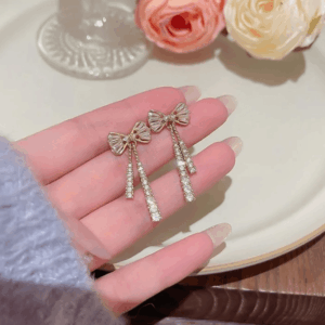 Trendy CZ Inlaid Bowknot Tassel Earrings - ArtGalleryZen