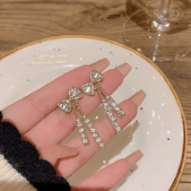 Trendy CZ Inlaid Bowknot Tassel Earrings - ArtGalleryZen