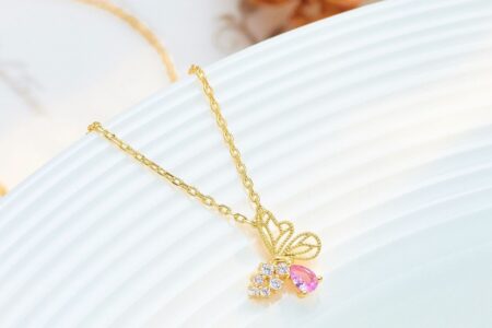 2025 fashion jewelry trends showcase featuring geometric designs, colorful gemstones, and layered styling examples